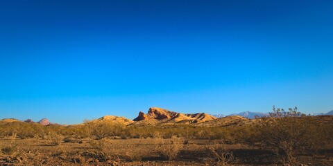 Andean desert landscape beneath a deep blue sky near Uspallata, Mendoza, Argentina.