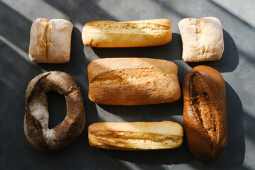 Assorted baked products. Bread background, knolling style.