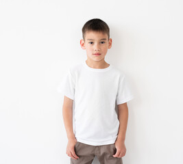 Cute little boy wearing blank white t-shirt