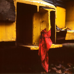 Red warning flag tied on yellow construction vehicle. Minneapolis Minnesota MN USA