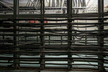 Lots of cables on the cable trays in the cable hub.