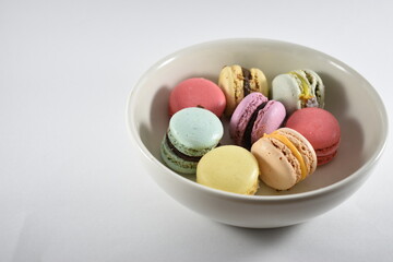 
spectacular views of some different colored sweets on a white background