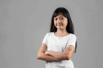 Asian girl studio portrait on gray background