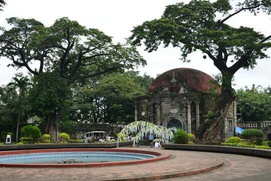 Saint Pancratius Chapel facade and water fountain at Paco park in Manila, Philippines