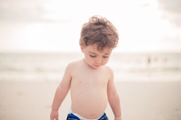 little boy running on the beach in Marco island florida 