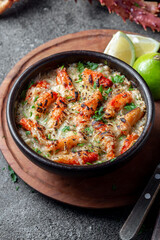 Chilean food. Baked crabmeat crab meat with cheese, cream and bread. Pastel o chupe de sentolla or king crab
