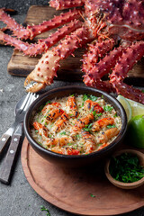 Chilean food. Baked crabmeat crab meat with cheese, cream and bread. Pastel o chupe de sentolla or king crab
