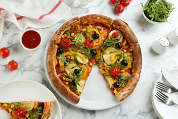 Delicious vegetable pizza on white marble table, flat lay