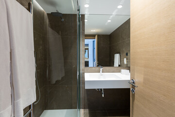 Interior of a hotel bathroom interior with shower cabin