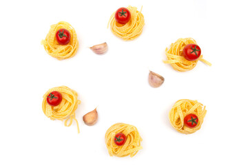 Raw Pasta with ingredients on white background. Top view