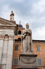 Obraz premium View of the facade and the cupola of the neoclassical Duomo di Urbino, Urbino Cathedral in the Marche, Italy.