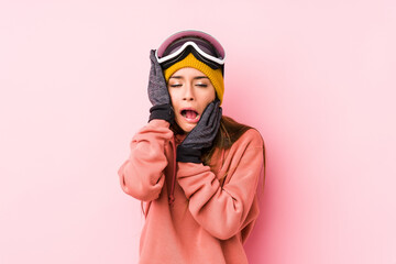 Young caucasian woman wearing a ski clothes isolated whining and crying disconsolately.