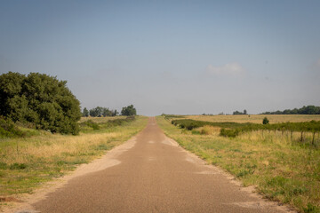 Rural Countryside road following Route 66 in America.