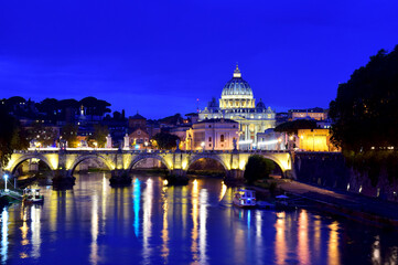 Fototapeta premium Saint Peter Cathedral and bridge at night in Rome, Italy