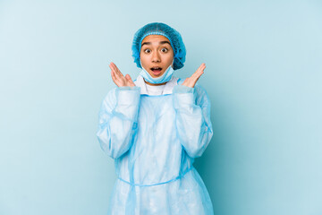 Young surgeon asian woman isolated surprised and shocked.