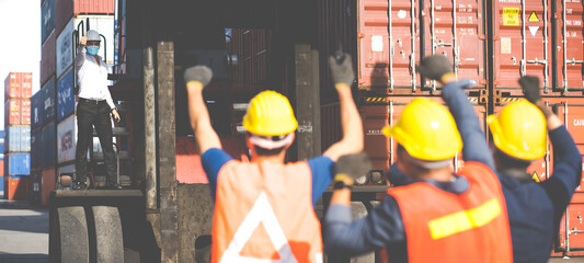 Strike of workers in container yard. Group of multiethnic engineer people during a protest in...