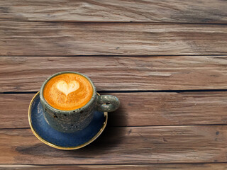 coffee cup on a vintage table at coffee shop , food and drink concept,