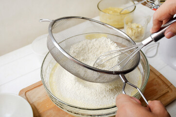 mixing dough in a bowl