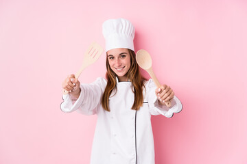 Young caucasian chef woman cooking
