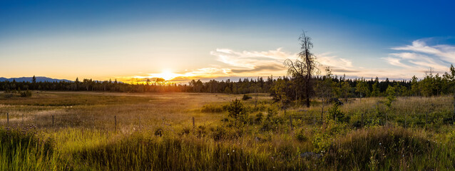 Panoramic View of a Beautiful Canadian Landscape during a Sunny Summer Sunset. Taken near Clinton, British Columbia, Canada.