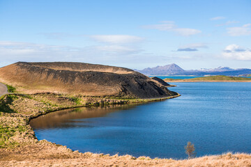 Fototapeta na wymiar The volcanic craters and lake landscape in Myvatn area, in Iceland, during summer time.
