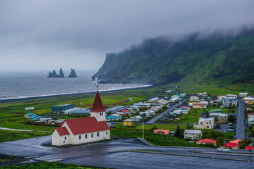 The small red roof church in Vik, Iceland, during summer time.