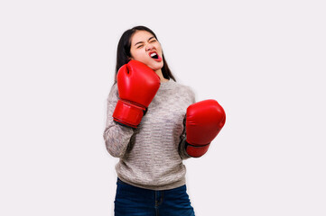 Asian woman wearing boxer gloves on White background