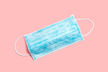 Blue surgical mask overhead view - flat lay