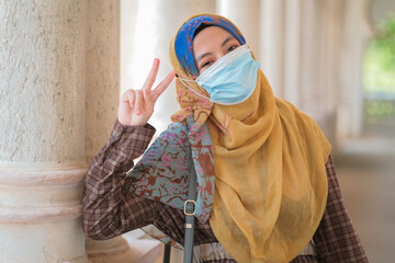 Portrait of young beautiful asian muslim woman in hijab