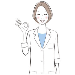 A woman doctor wearing white lab coat showing ok sign.