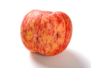 apple with two dents on white