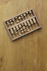 Abacus on a wooden background