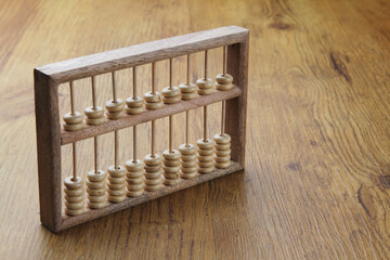 Abacus on a wooden background