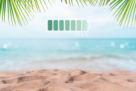 Fully Charge Battery 100% Sign Icon On Natare Summer Beach On Vacation Day. Holiday Long Weekend Relax Time.