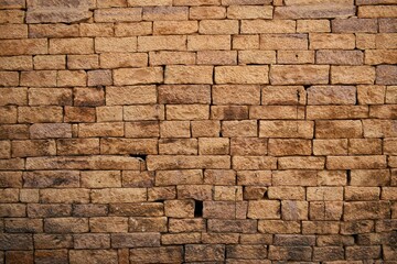 golden colour stone brick wall grunge background