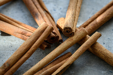 Cinnamon sticks on a concrete table