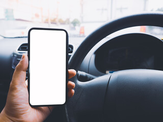 Close up blank empty screen smartphone on holder in car use for Navigation or GPS. Car interior view.