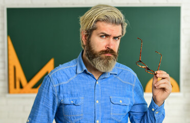 Science modern school. Back to school. Mature bearded man in glasses. Education concept. Intellectual task. Study in college. Cognitive development. Private lesson. Teacher mentoring school projects
