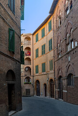 Fototapeta na wymiar Old Street at Siena, Tuscany Region in Italy 