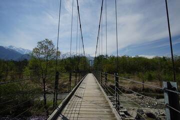 Beautiful landscape and suspension bridge in Northern Alps of Japan, Hakuba.