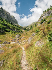 Fototapeta na wymiar Scenic ladscape with Deer Valley (Valea Cerbului) on the way to Omu peak, the highest peak in Bucegi Mountains, Romania.
