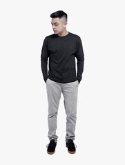 Naklejka premium Young handsome man wearing black long sleeve t shirt posing on white background