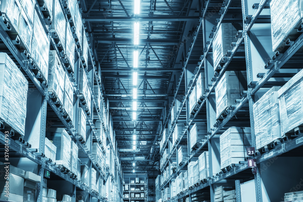 Wall mural goods on shelves of distribution center warehouse