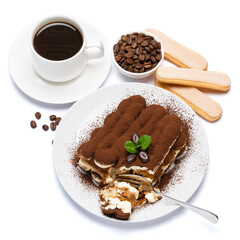 portion of Classic tiramisu dessert, savoiardi cookies and cup of fresh espresso coffee isolated on white background with clipping path