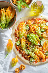 Ingredients for vegetarian pizza made of summer vegetables