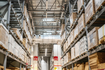 Fototapeta premium Goods on shelves of distribution center warehouse