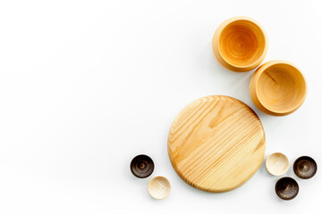 Making wooden dishes. Village table with wooden cutlery set rustic background top view mockup