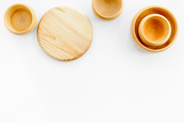Making wooden dishes. Village table with wooden cutlery set rustic background top view mockup