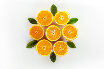Orange slices on white pattern background top view copy space