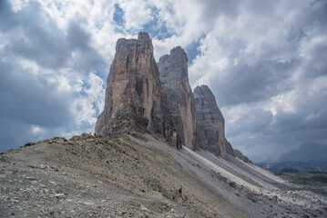 Fototapeta na wymiar View of the iconic Tre Cime di Lavaredo peaks as seen from the trail to Locatelli refuge from Lavaredo refuge via Paterno pass, Sesto/Sexten Dolomites, South Tirol, Italy.